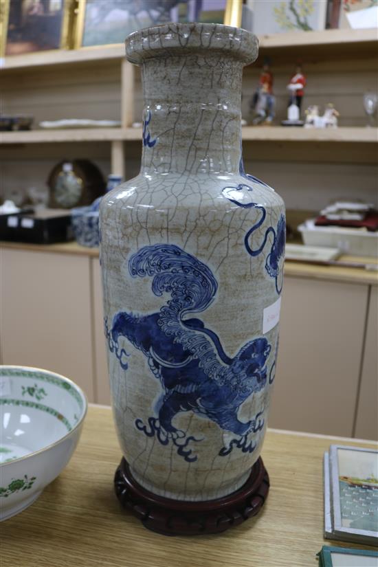 A Chinese blue and white crackle glaze rouleau vase, wood stand height 49cm